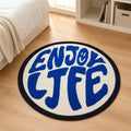 Alfombra infantil redonda con diseño Enjoy Life en colores azul y crema