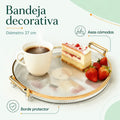 Bandeja decorativa redonda con asas doradas, borde protector y superficie transparente