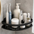 Organizador esquinero de baño color negro para guardar cepillos, frascos y productos de higiene