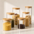 Frascos de vidrio borosilicato con tapa de bambú para almacenar cereales, granos y alimentos secos.