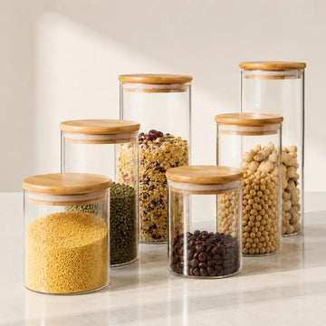 Frascos de vidrio borosilicato con tapa de bambú para almacenar cereales, granos y alimentos secos.