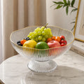 Frutero decorativo con base elevada y frutas para mesa de cocina o comedor