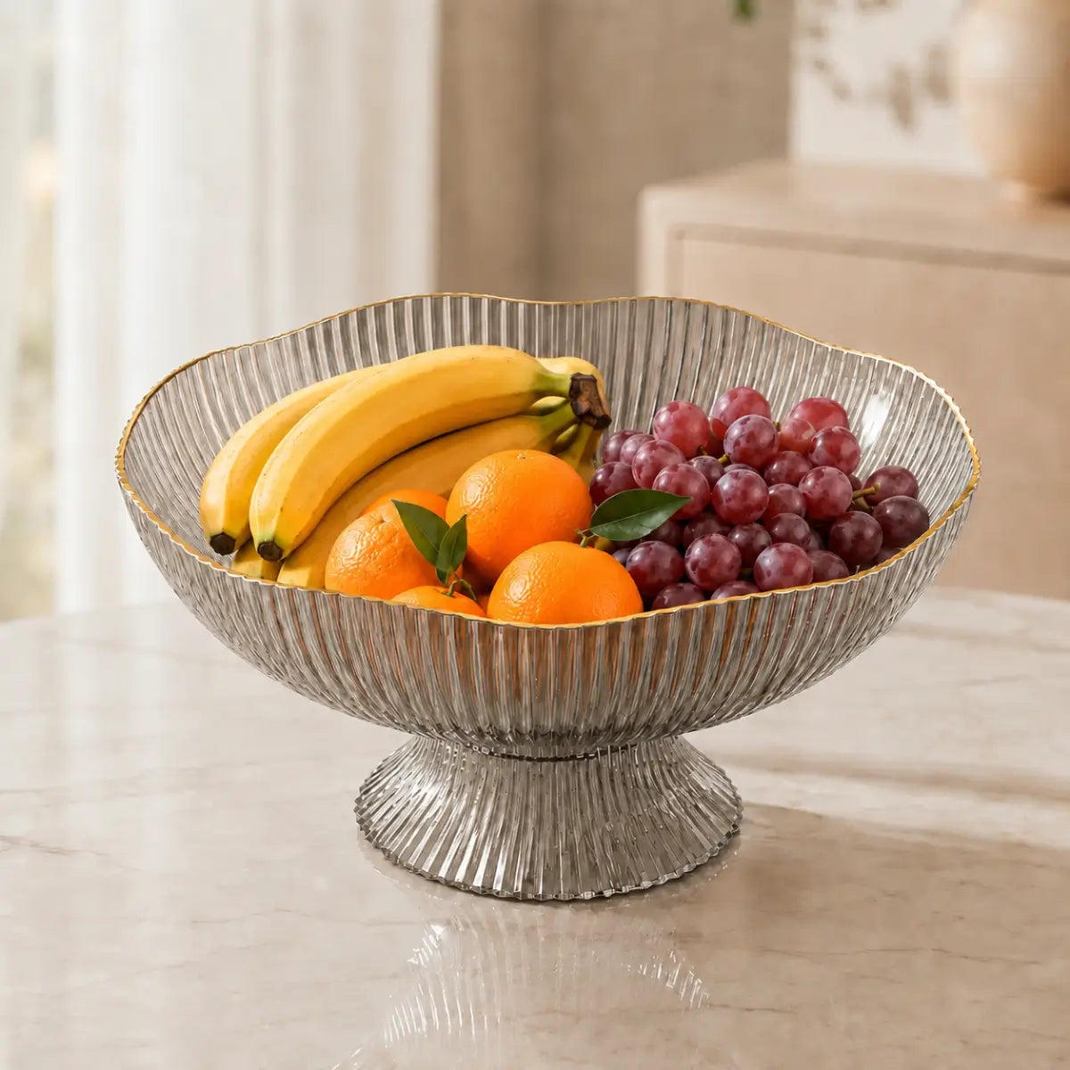 Frutero con drenaje color oscuro y base elevada para organizar diferentes frutas