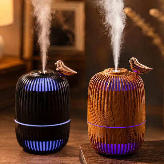 Humidificador decorativo con efecto madera, luz LED y adorno de pájaro con salida de vapor