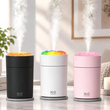 Humidificador portátil con luz LED multicolor y salida de vapor disponible en negro, blanco y rosado