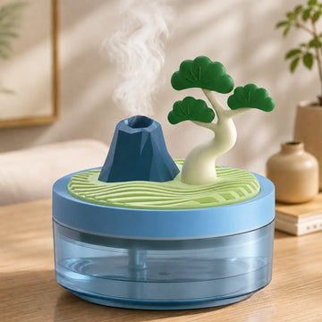 Humidificador decorativo con efecto volcán y diseño de bonsái para ambientar el hogar