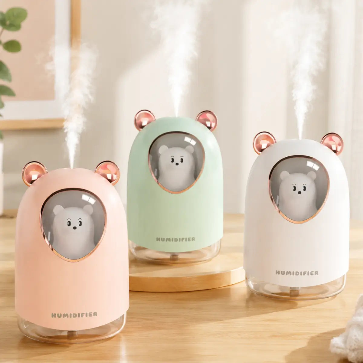 Humidificador con diseño de oso y luz LED disponible en colores rosado, verde y blanco