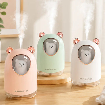 Humidificador con diseño de oso y luz LED disponible en colores rosado, verde y blanco