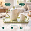 Set de té con tetera y tazas para servir bebidas calientes en reuniones y desayunos