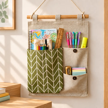 Organizador de pared con bolsillos de tela para guardar útiles escolares, cuadernos y accesorios