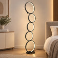 Lámpara de pie LED con diseño de cinco aros y luz cálida para sala o dormitorio