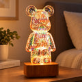 Lámpara decorativa de oso con luz LED multicolor y base efecto madera