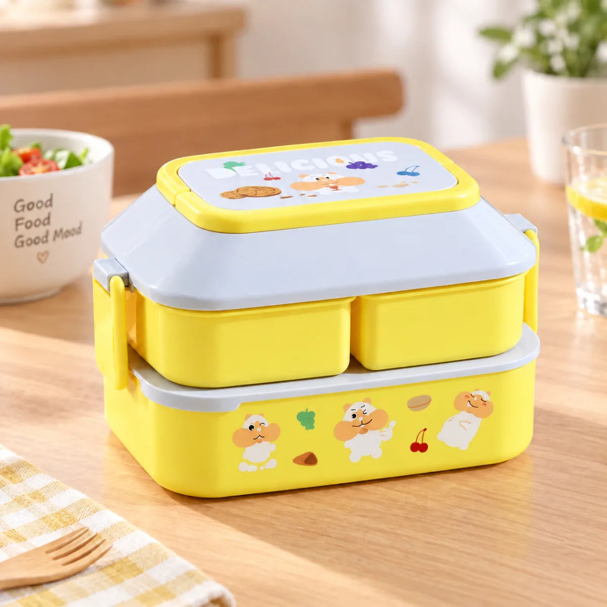 Lonchera infantil de 2 niveles con compartimentos, asa superior y diseño amarillo