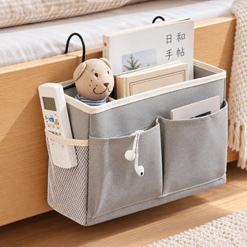 Organizador de cama con bolsillos para guardar libros, celular, controles y accesorios junto al dormitorio