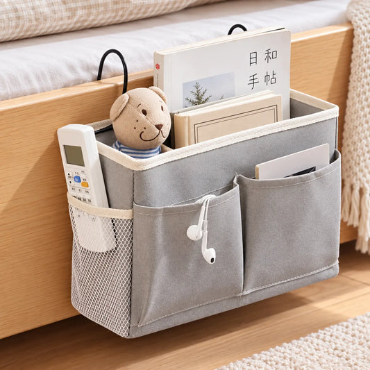 Organizador de cama con bolsillos para guardar libros, celular, controles y accesorios junto al dormitorio